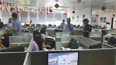 廣州市公安部門查處“三打哈”網(wǎng)運營公司的現(xiàn)場。廣州市公安局供圖