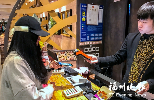 移動(dòng)支付為節(jié)日減負(fù)　支付方式變了但年味不丟