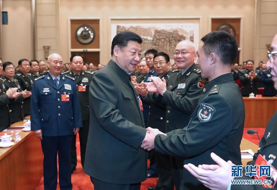  3月12日上午，中共中央總書記、國家主席、中央軍委主席習近平出席十三屆全國人大一次會議解放軍和武警部隊代表團全體會議。