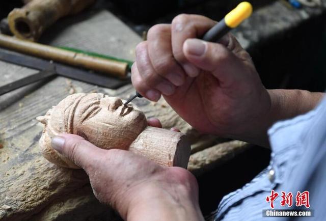 福建漳州千年木偶頭雕刻技藝 一刀雕出眾生相 