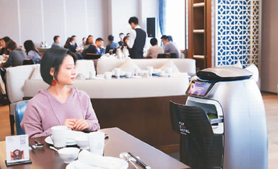 刷臉開(kāi)房門(mén)機(jī)器人送餐 阿里首家未來(lái)酒店迎客