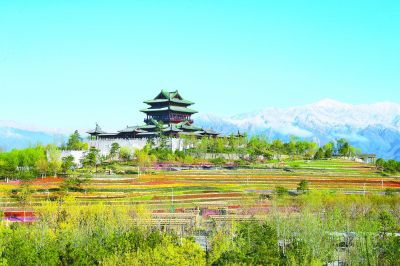 “海陀戴雪”映照世園